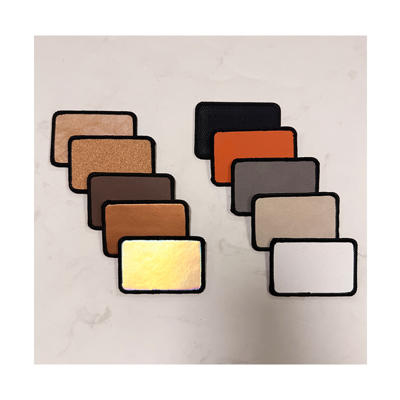 3 1/2' x 2 1/2' rechthoekige laserbare kunstleren Merrow-patch met lijm 3 1/2' x 2 1/2' rechthoekige laserbare kunstleren Merrow-patch met lijm