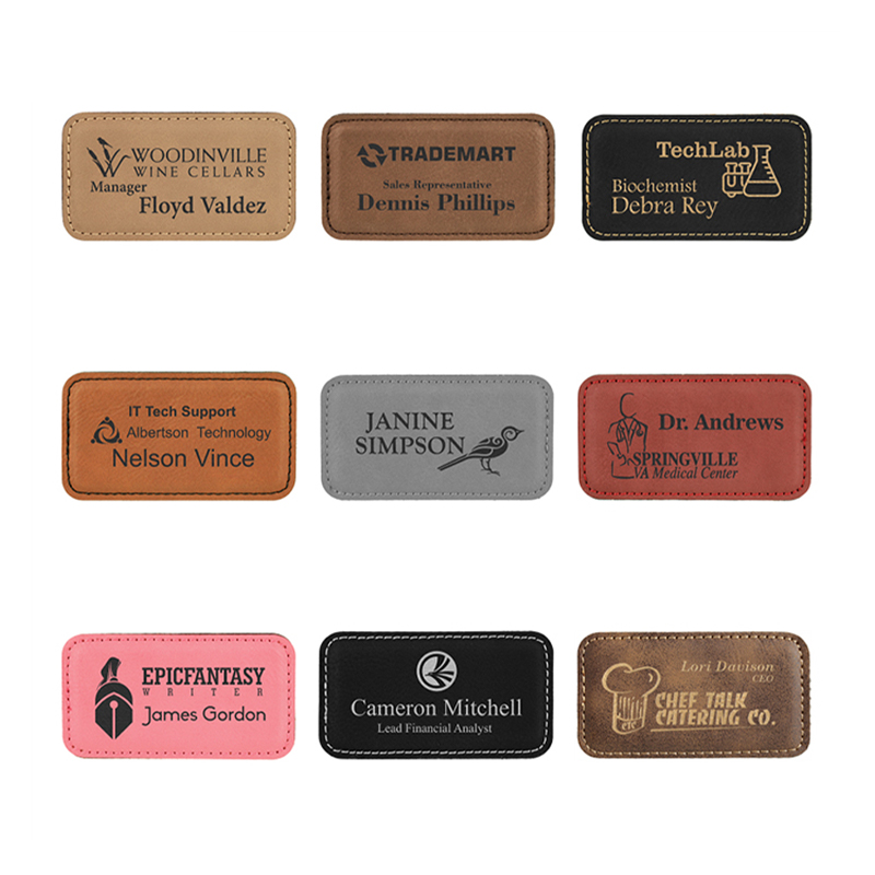 Grote rechthoekige naambadges van imitatieleer Grote rechthoekige naambadges van imitatieleer