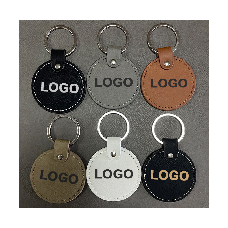 Laserbare ronde sleutelhangers van kunstleer met geoliede rand Laserbare ronde sleutelhangers van kunstleer met geoliede rand